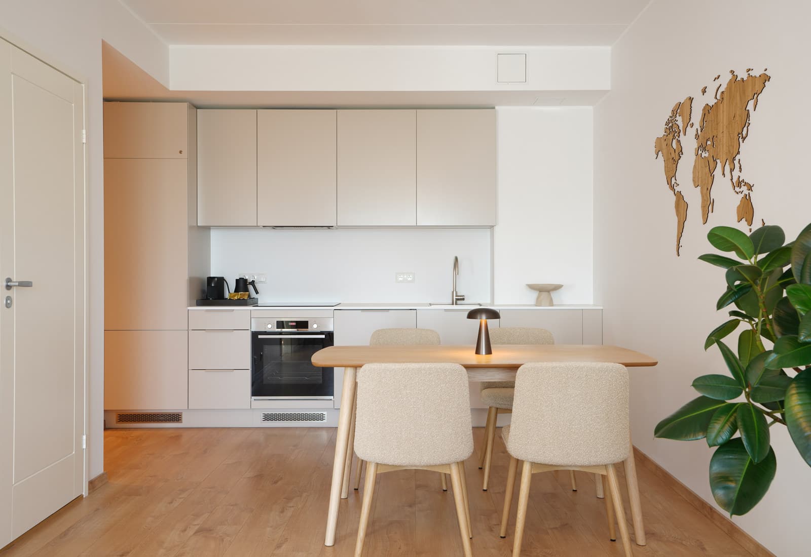 The Kashi kitchen and dining table in warm morning light